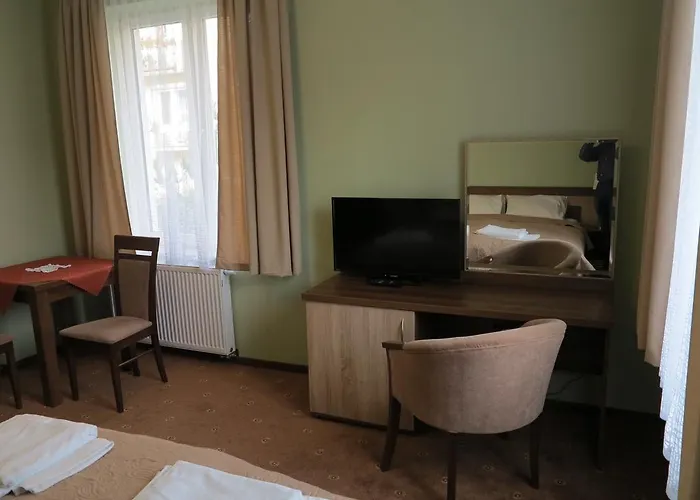 Quarto em Acomodações Particulares Rofel Goscinne *